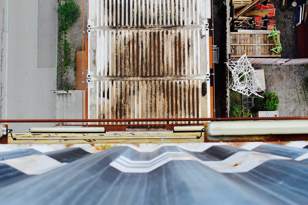 aerial view photography of house with GI sheet roof