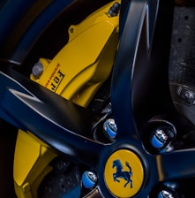 closeup photo of vehicle Ferrari wheel and tire