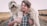man carrying long-coated white dog