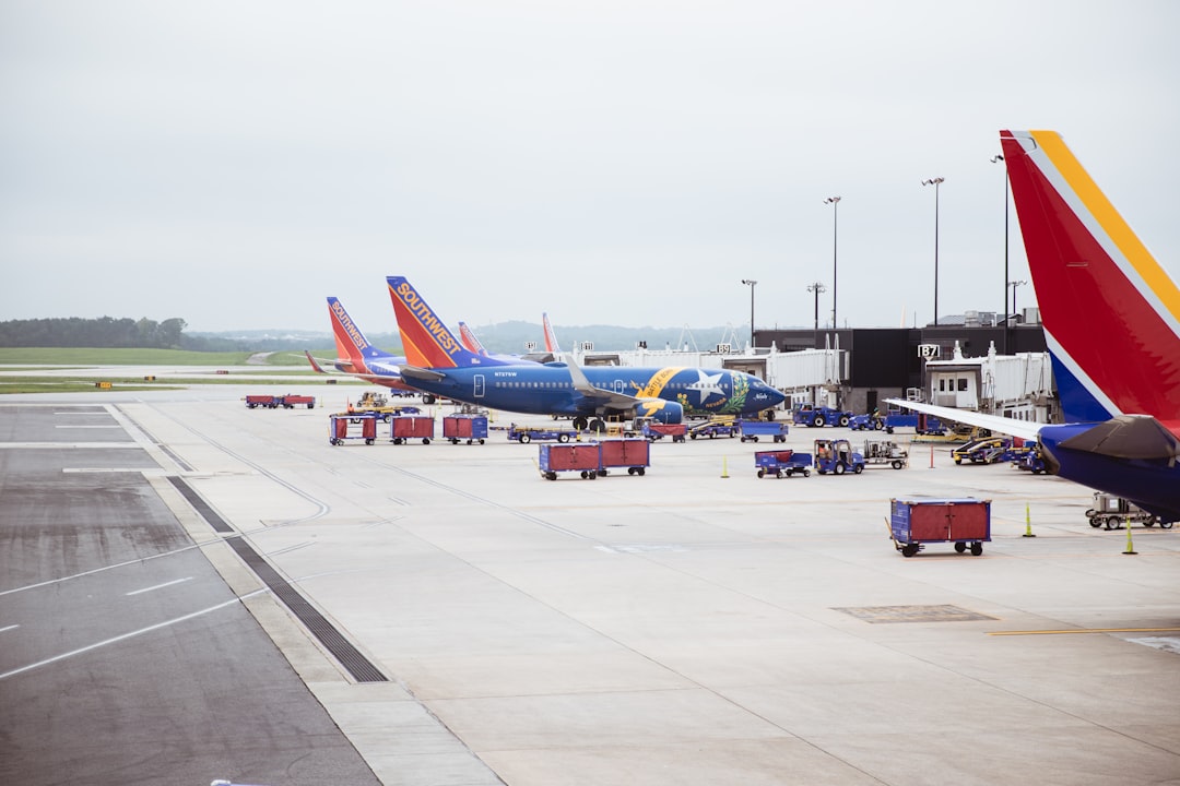 parked passenger airplane on airport, southwest nevada one