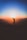 silhouette of man standing on mountain peak