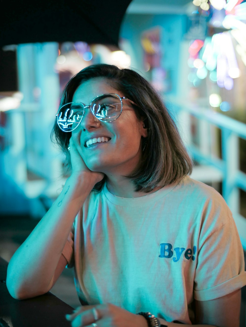 woman putting her hand on cheek