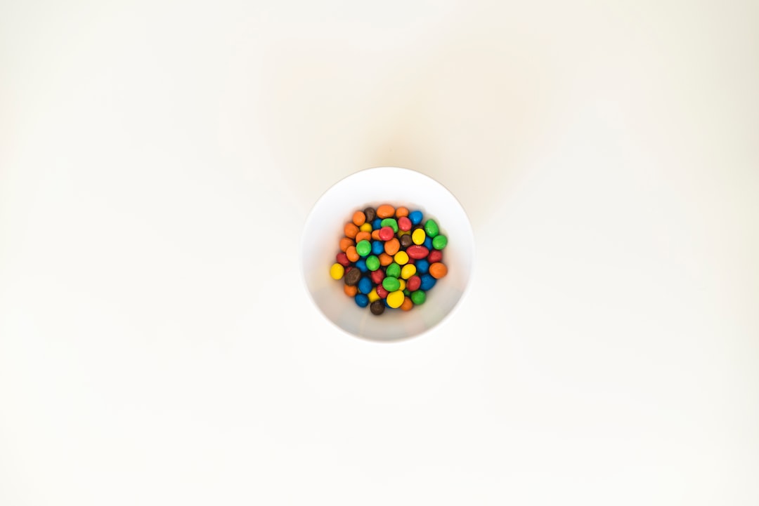 multicolored pebbles in white bowl