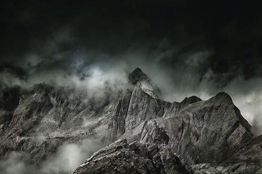 grayscale photography of rock formation in Säntis Switzerland
