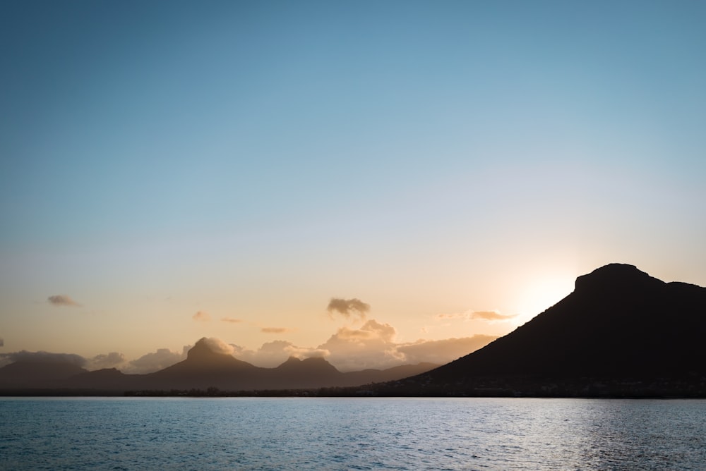 landscape photography of mountain near body of water