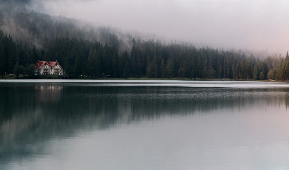 landscape photography of house near body of water