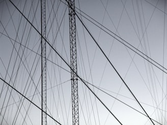 grayscale photography of gray steel structure