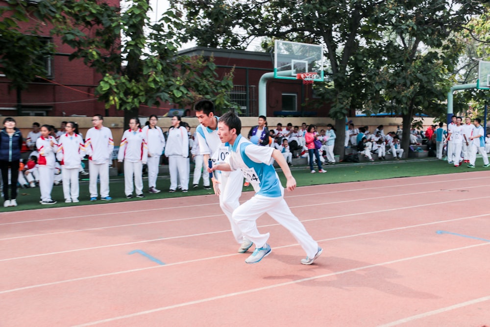 men doing track and field