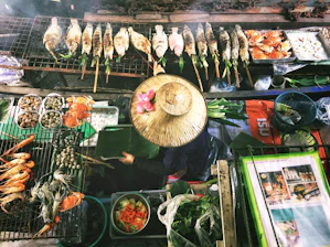 person wearing Asian conical hat
