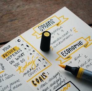 yellow marker on white paper journal