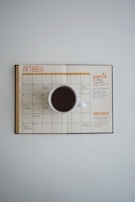 A candid shot of Adarsh reviewing strategic plans over coffee.