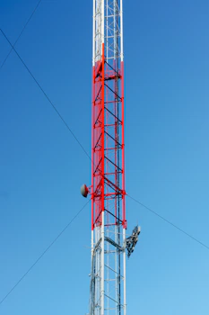 white and red satellite tower