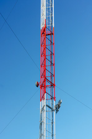 white and red satellite tower