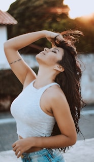 woman wearing white tank crop top