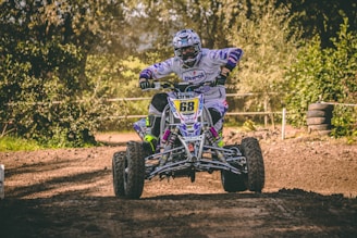 man riding ATV quad bike