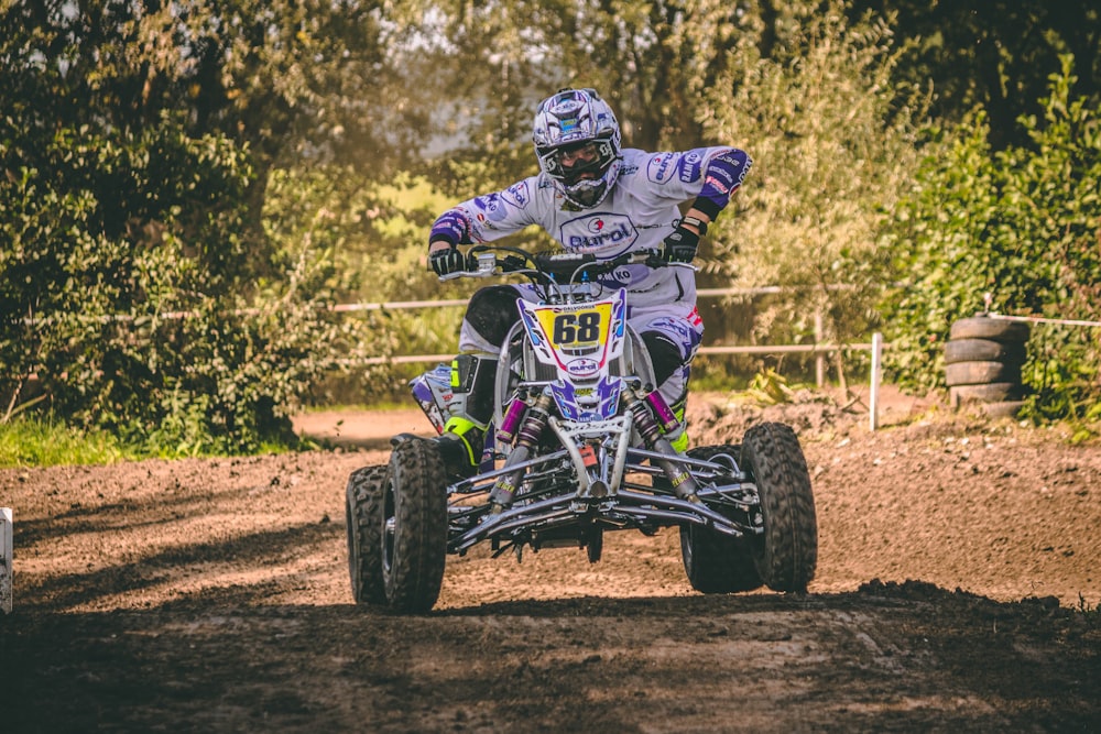 man riding ATV quad bike