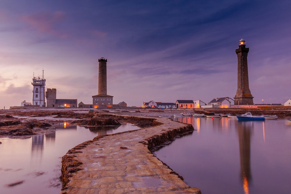 lighthouse tower near body of water