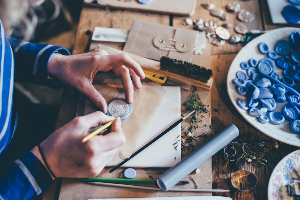 person doing handcrafts