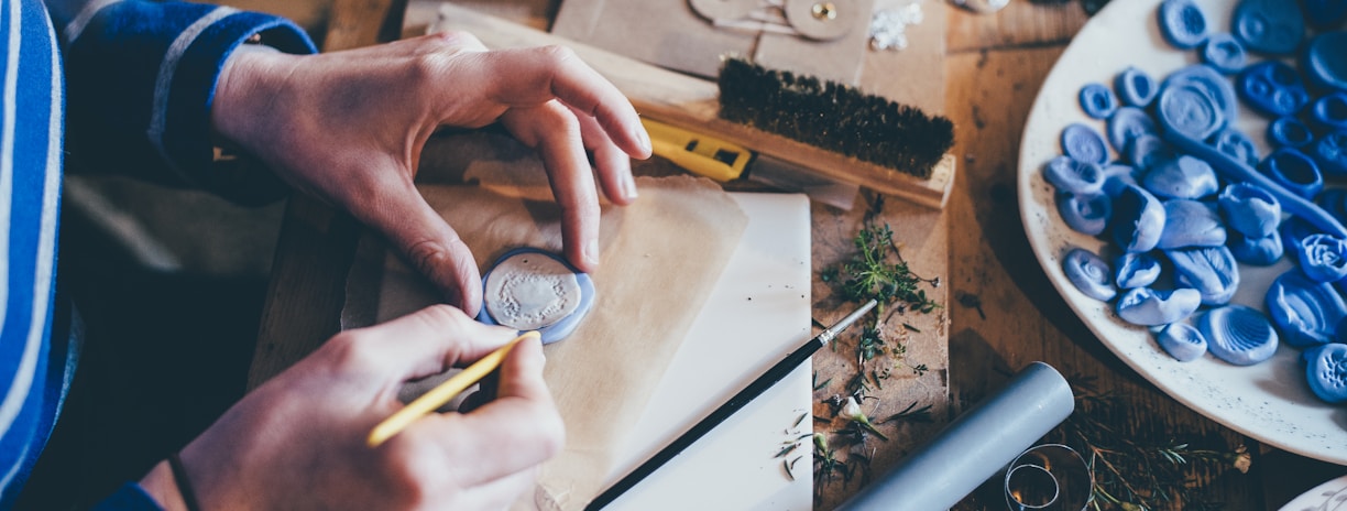 person doing handcrafts