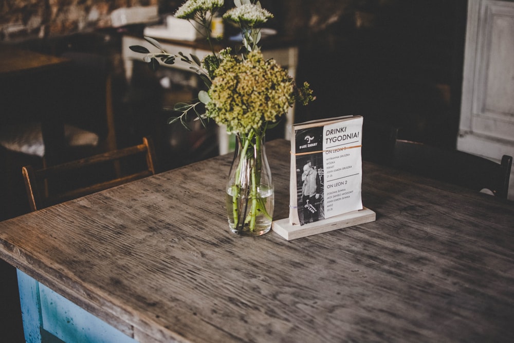 yellow petaled flower in vase