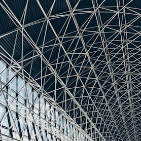 worm's-eye view of steel frame of indoor structure