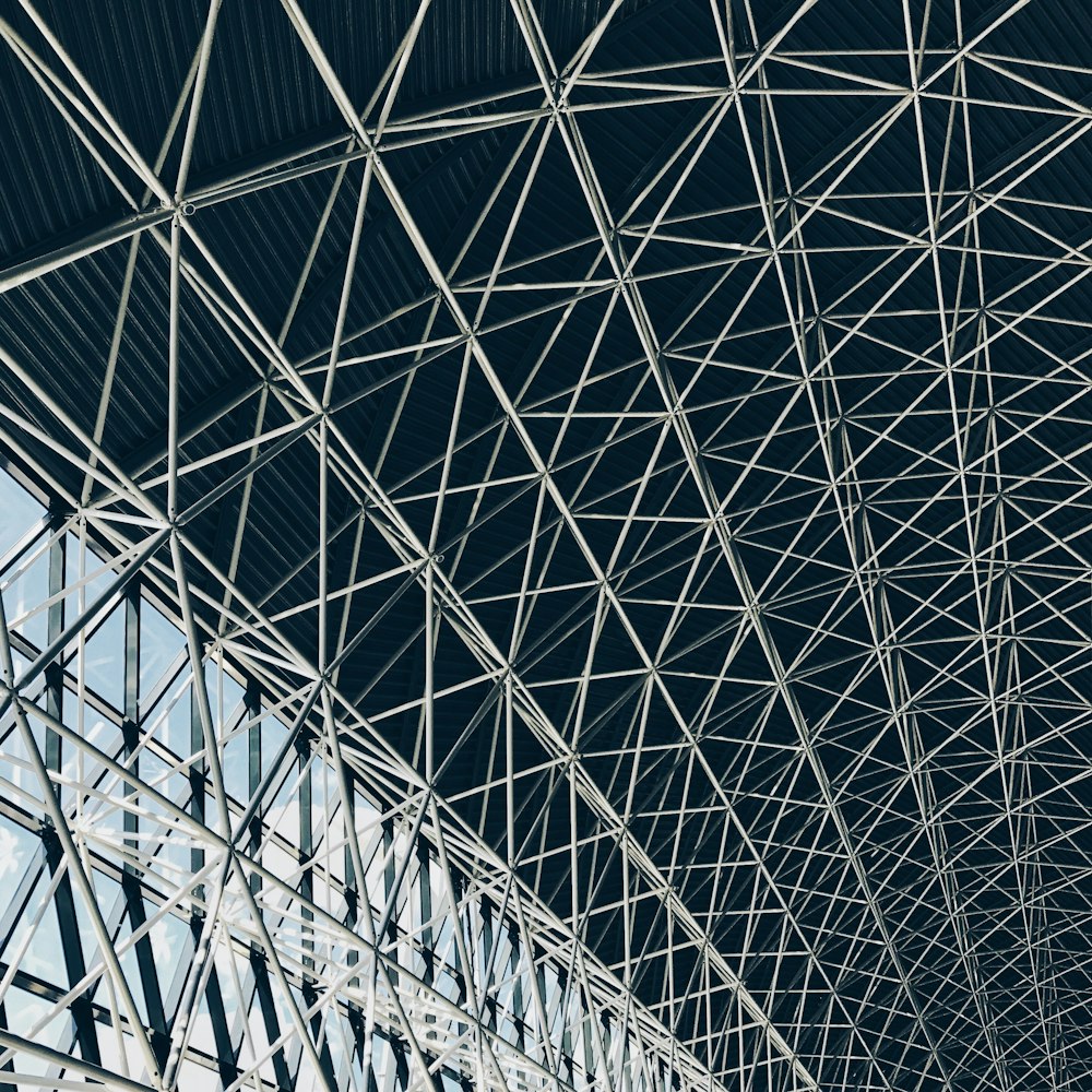 worm's-eye view of steel frame of indoor structure