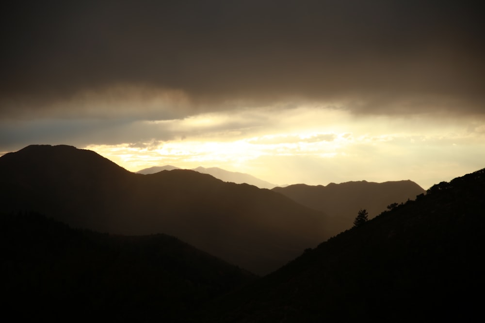 silhouette of mountains during daytime