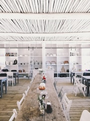 assorted dish display on table with chairs
