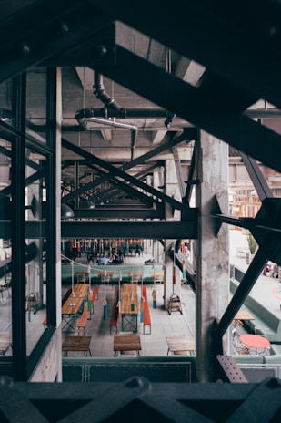 Industrial furniture showcasing dark steel and bold orange accents.