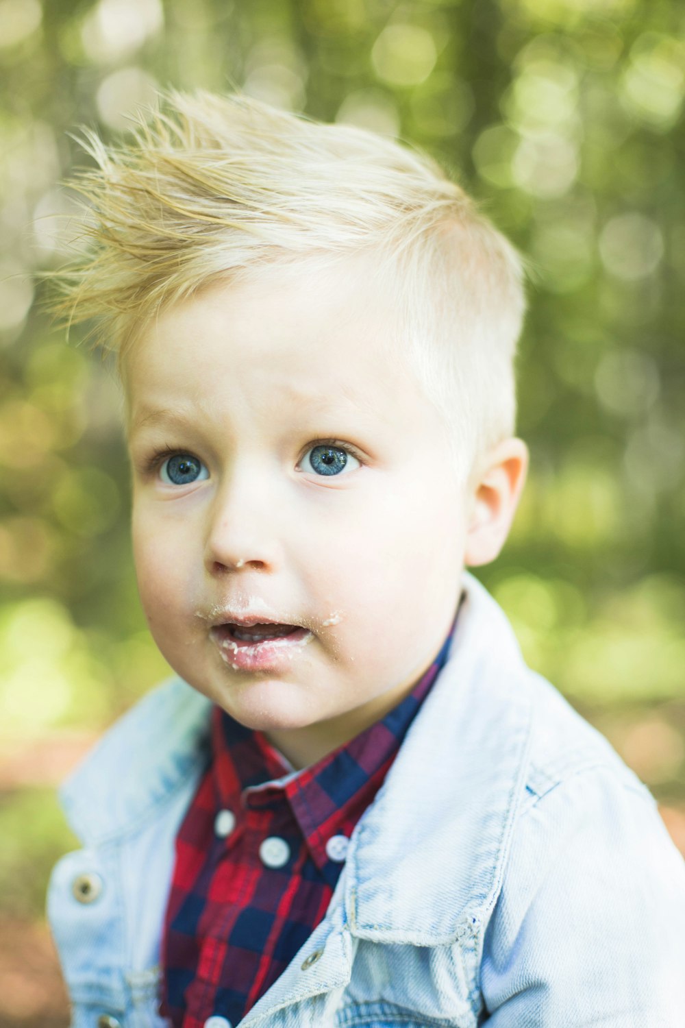 selective focus photography of boy