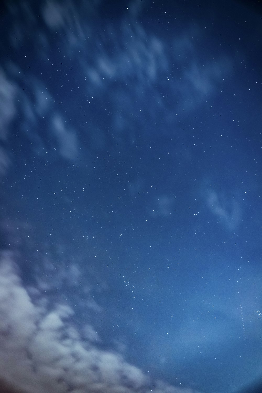 photo of blue sky covered with clouds