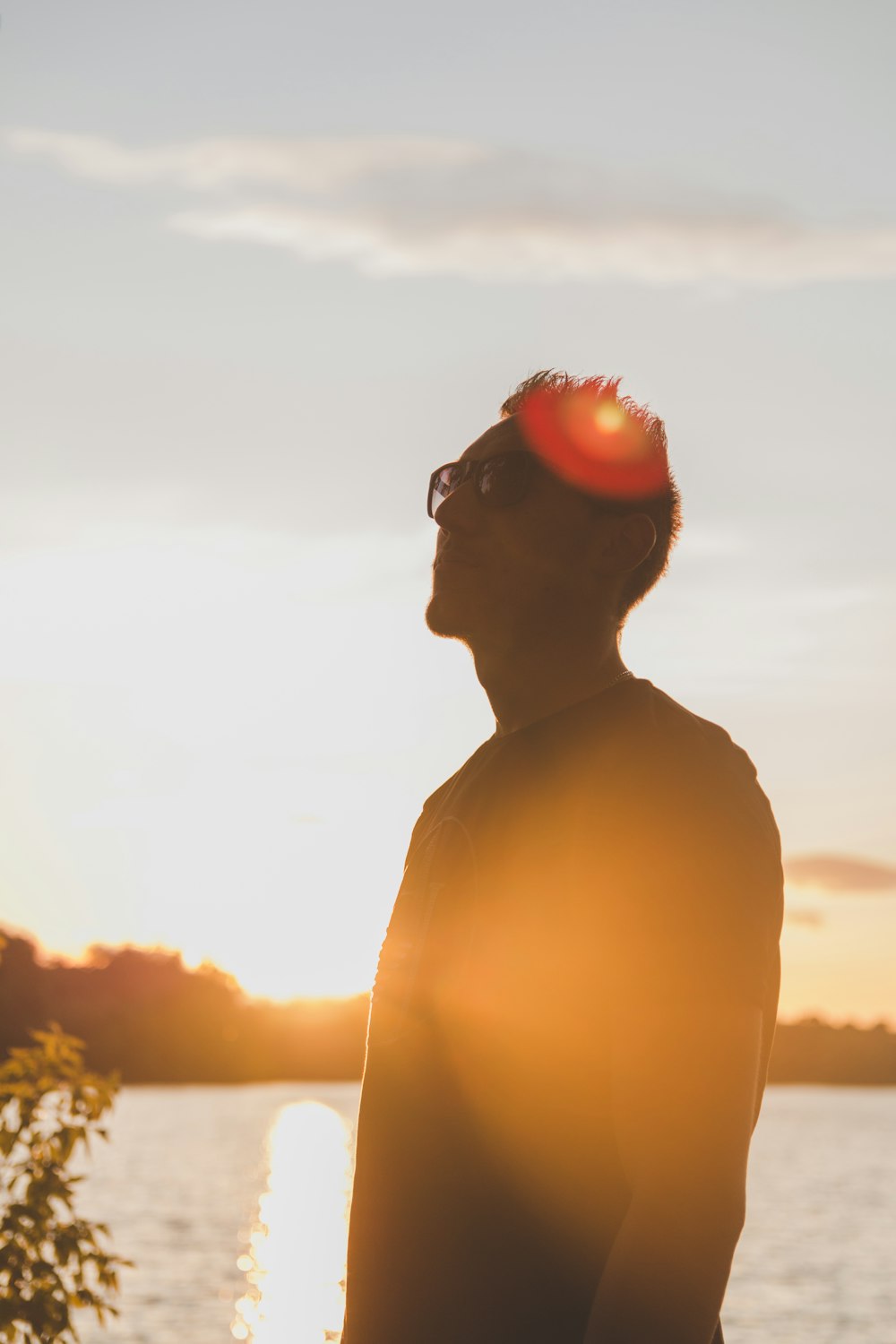 man standing near body of water