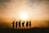 silhouette photo of six persons on top of mountain