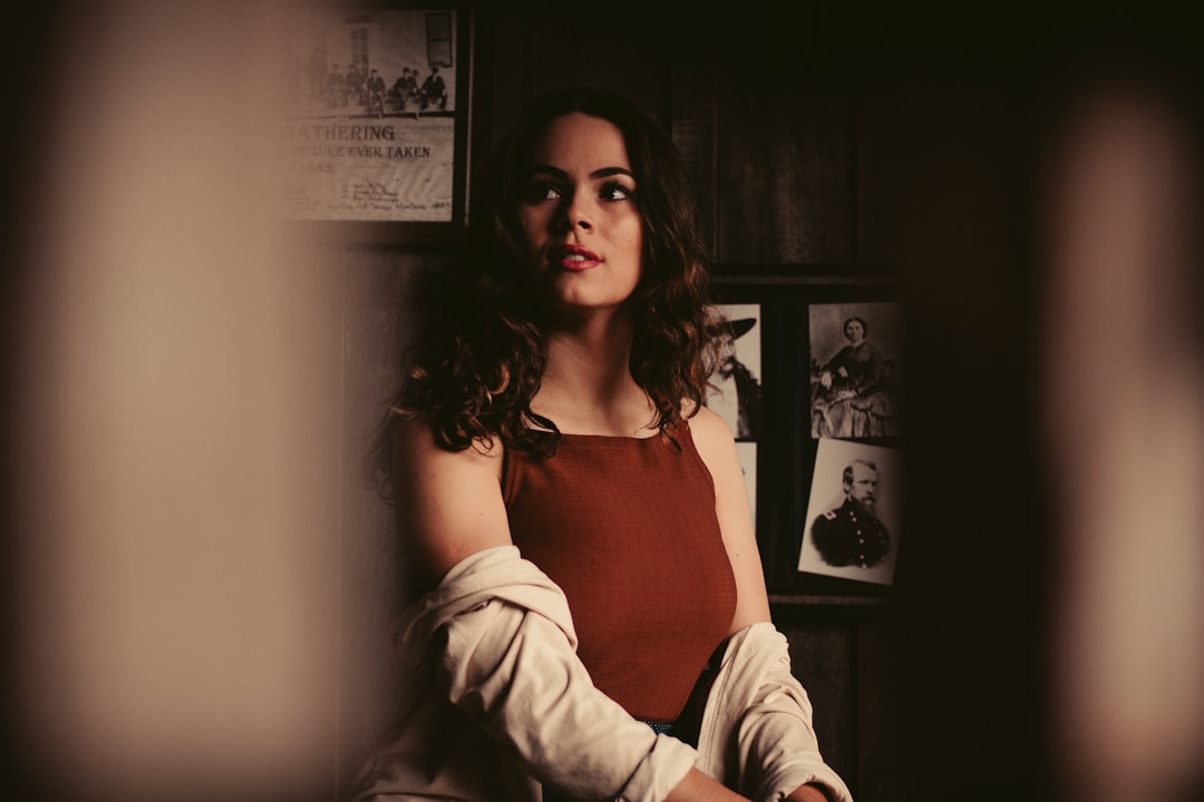 woman sitting inside room during daytime