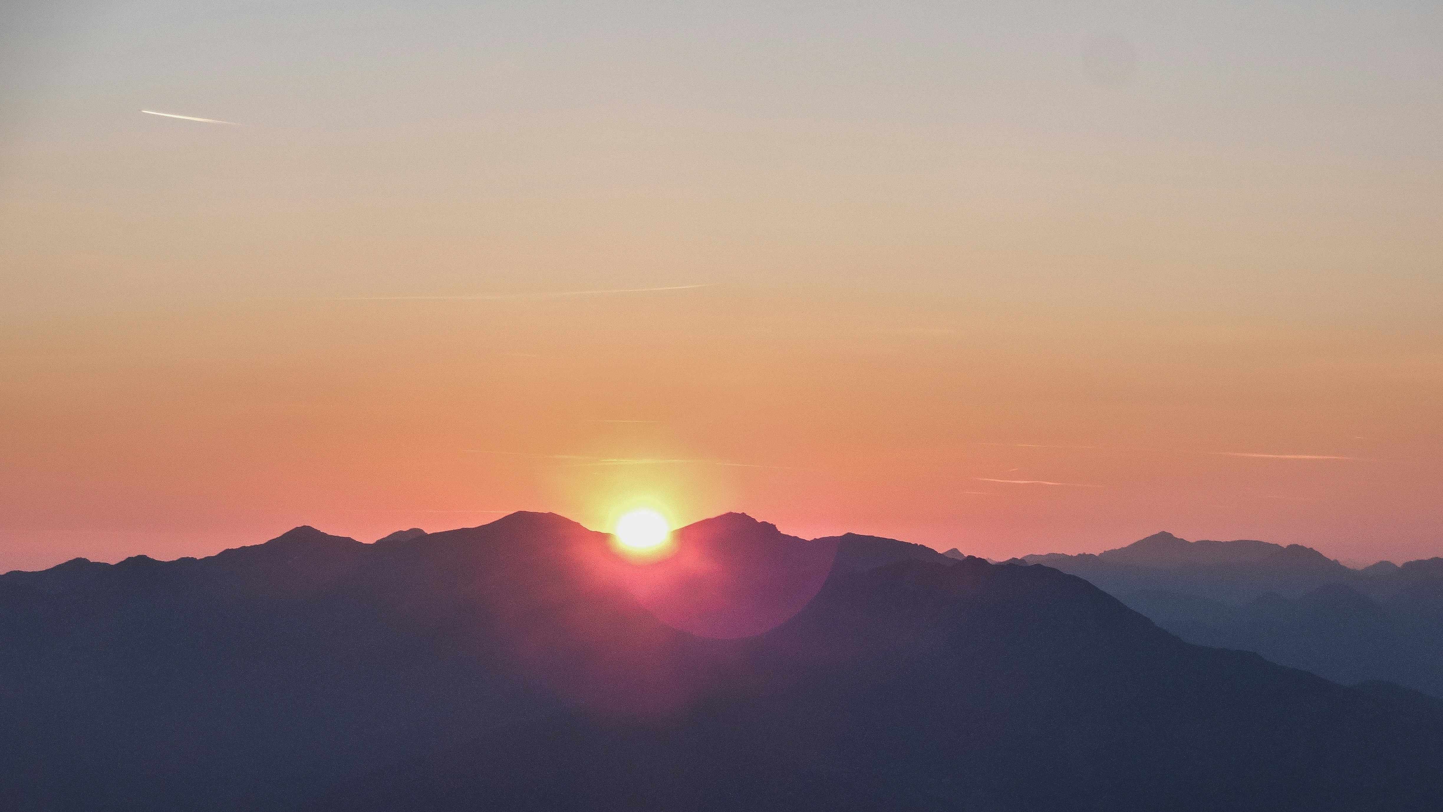 silhouette photo of mountain during dawn