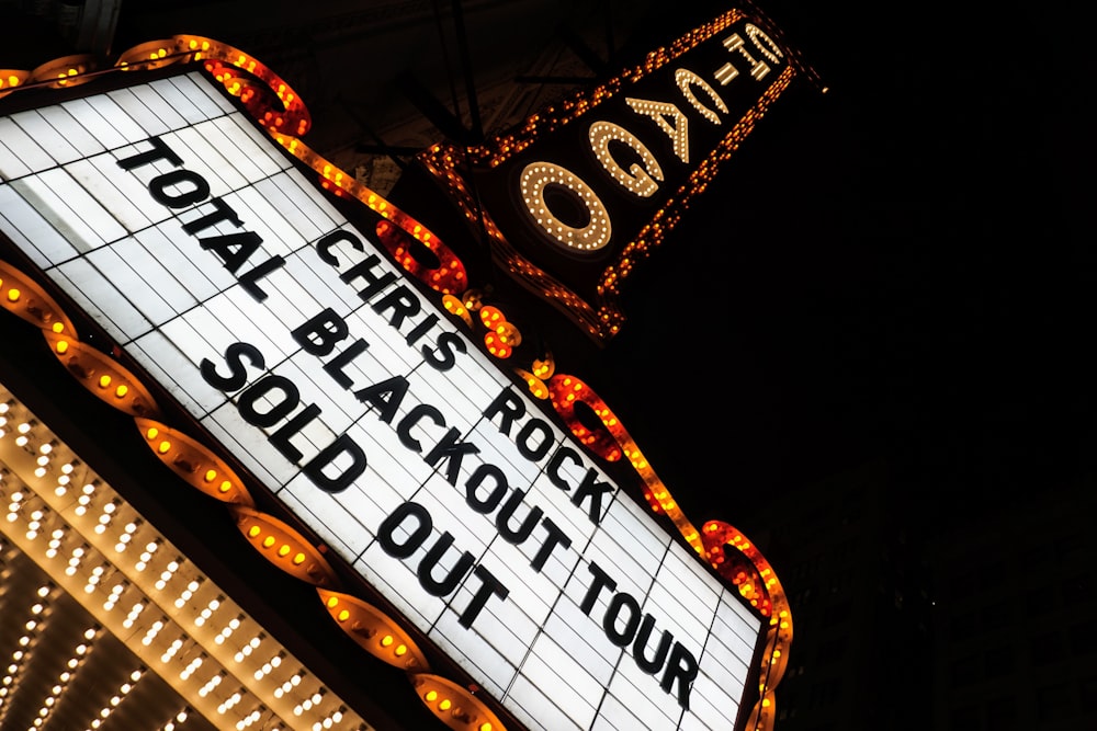 Chris Rock total blackout tour sold out neon signage