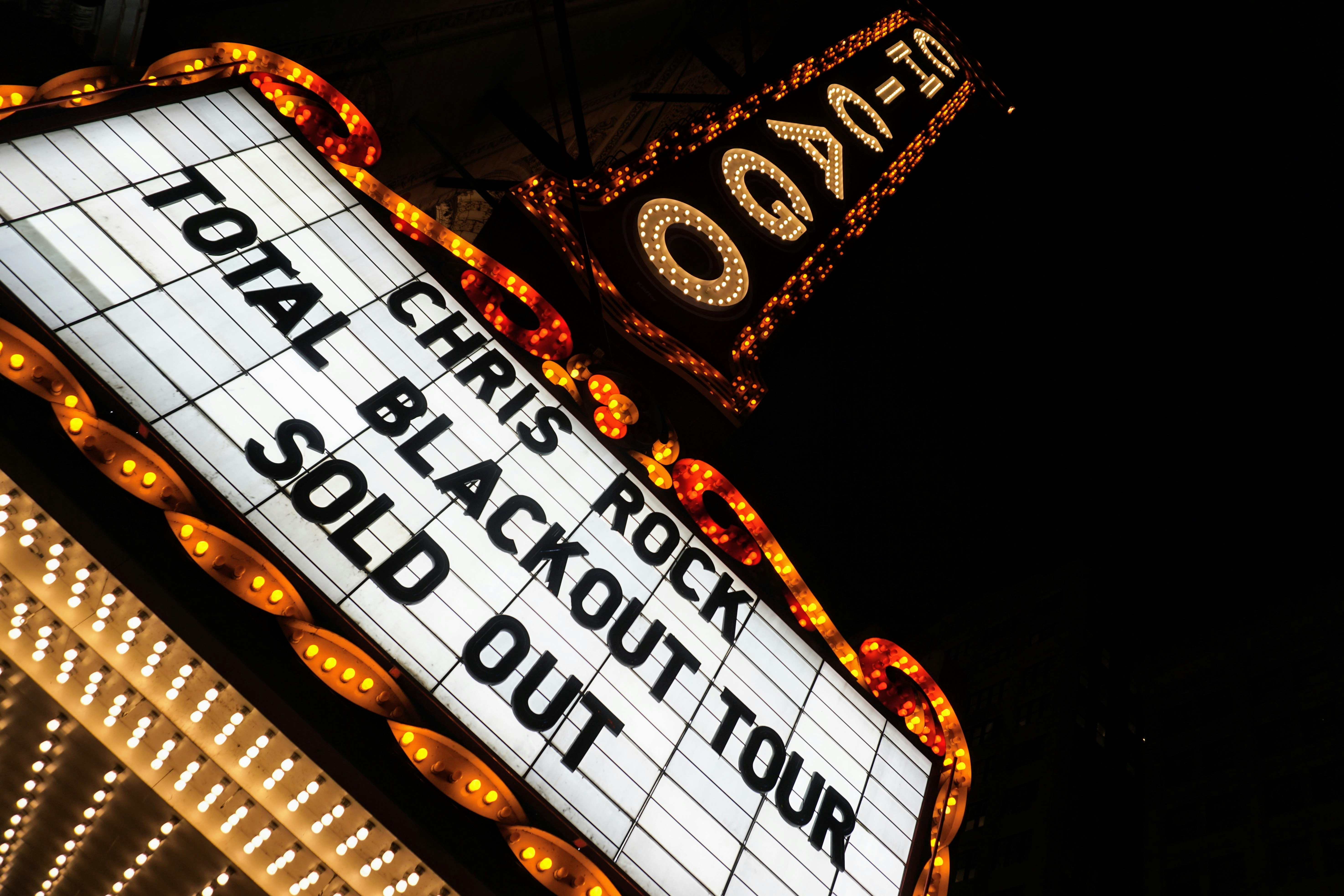 Chris Rock total blackout tour sold out neon signage