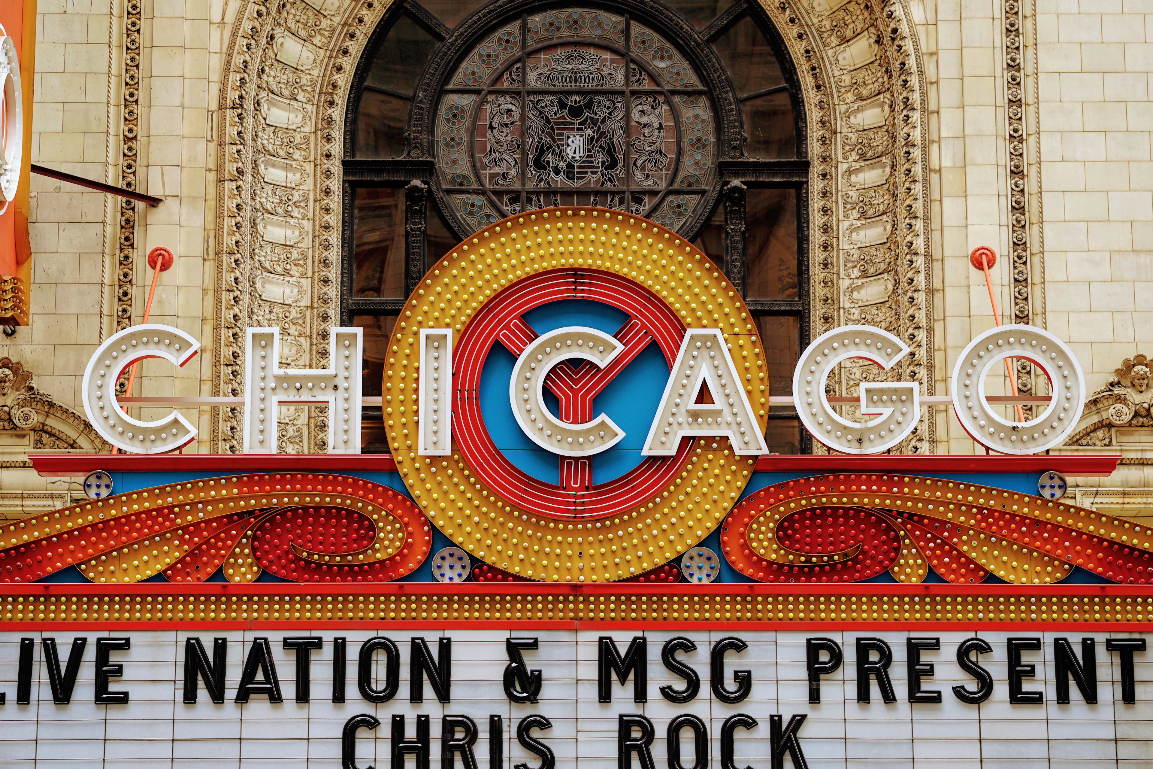 The Chicago Theatre's marquee lit up over State Street