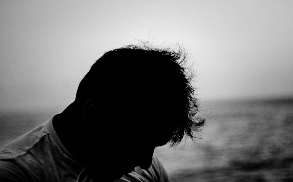 silhouette photo of man wearing T-shirt