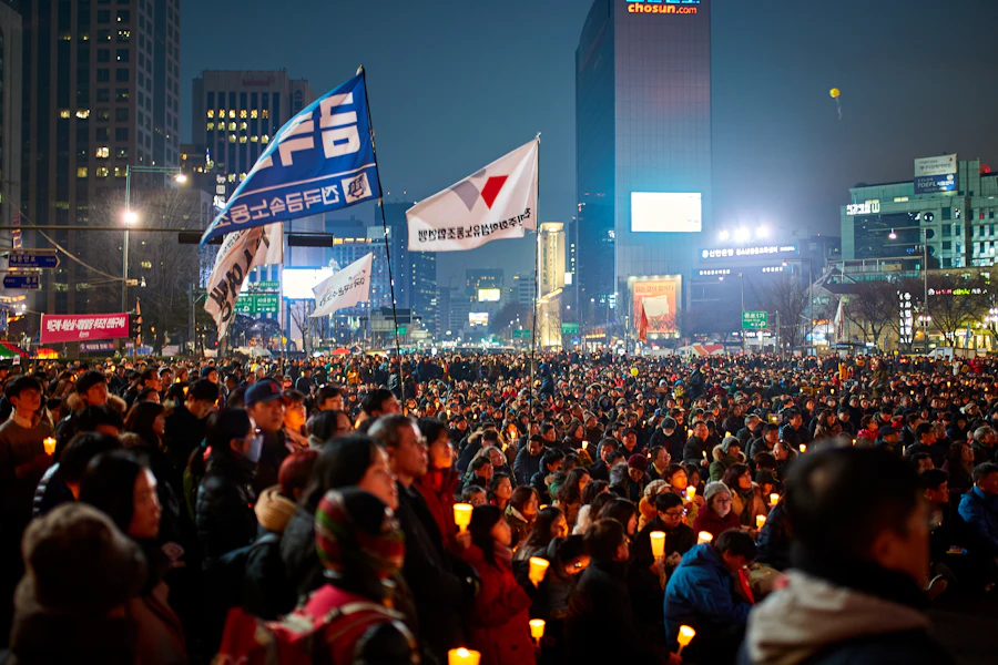 Visitors walking along Cheonggyecheon at night during lantern festival