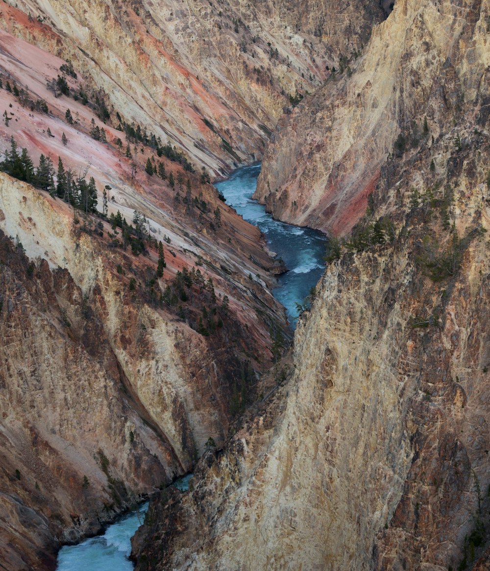 high-angle photography of river in between mountain