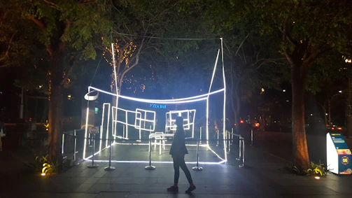 Creative guerrilla marketing installation in an urban setting at night