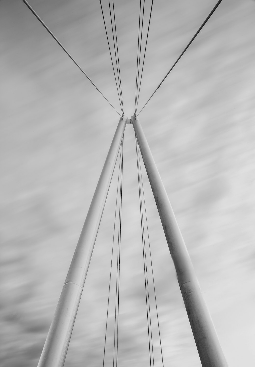 white steel poles with cables