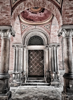 Elegant Masonic lodge entrance with classic architectural details and subtle golden accents.