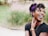 photo of woman wearing purple lipstick and black crew-neck shirt