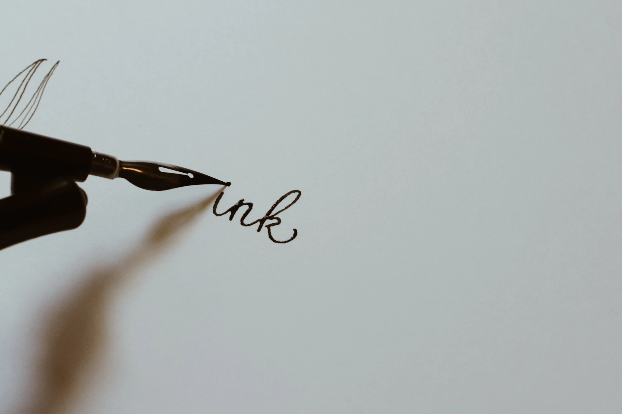 Writing with a fountain pen on paper