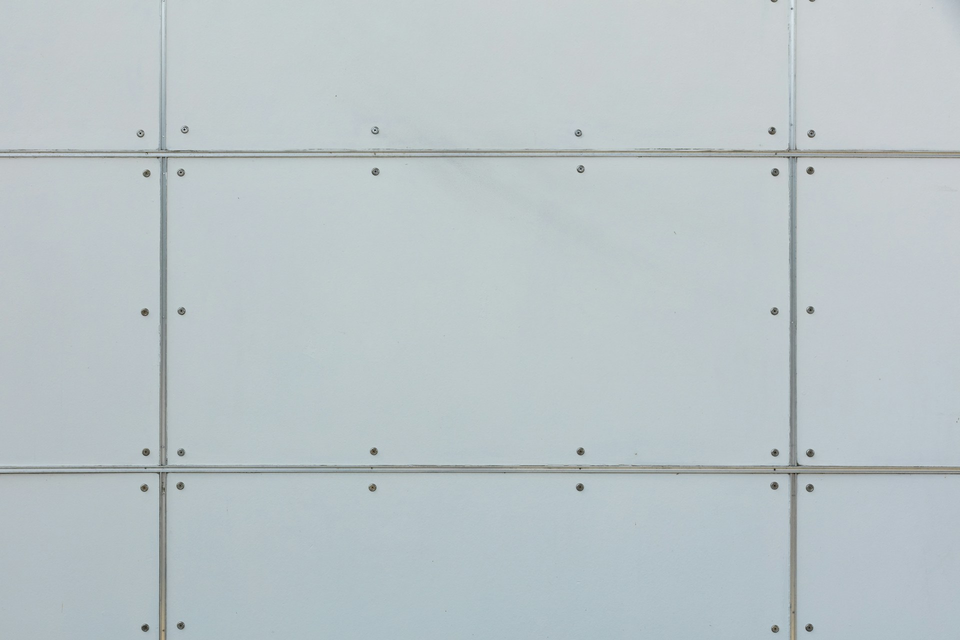 woman wearing yellow long-sleeved dress under white clouds and blue sky during daytime