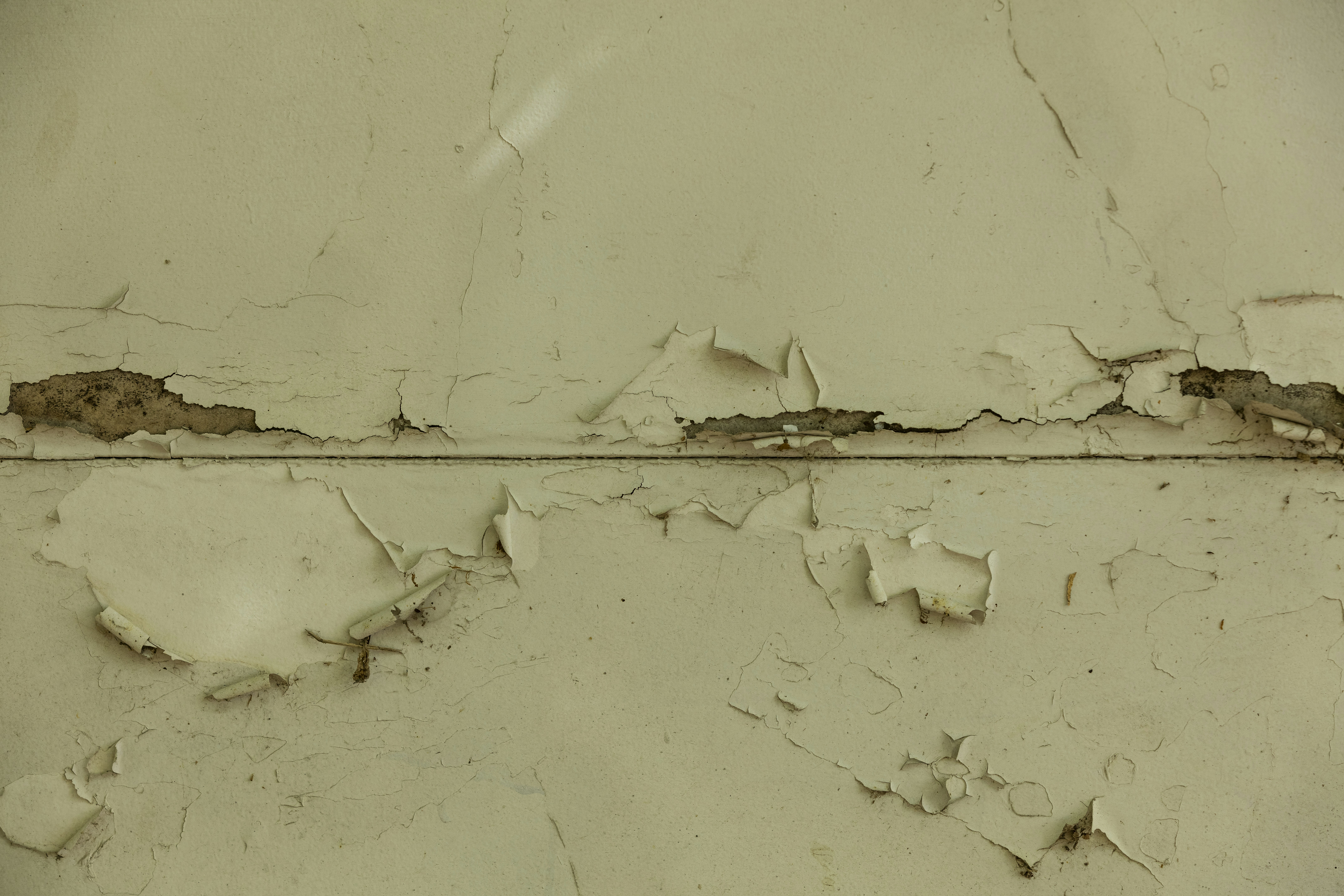 significant water damage on a floor near a wall - slab leak repair moorpark ca