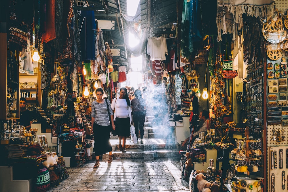 people walking on market during daytime