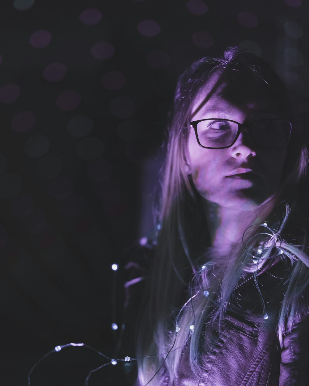 woman wearing black framed eyeglasses